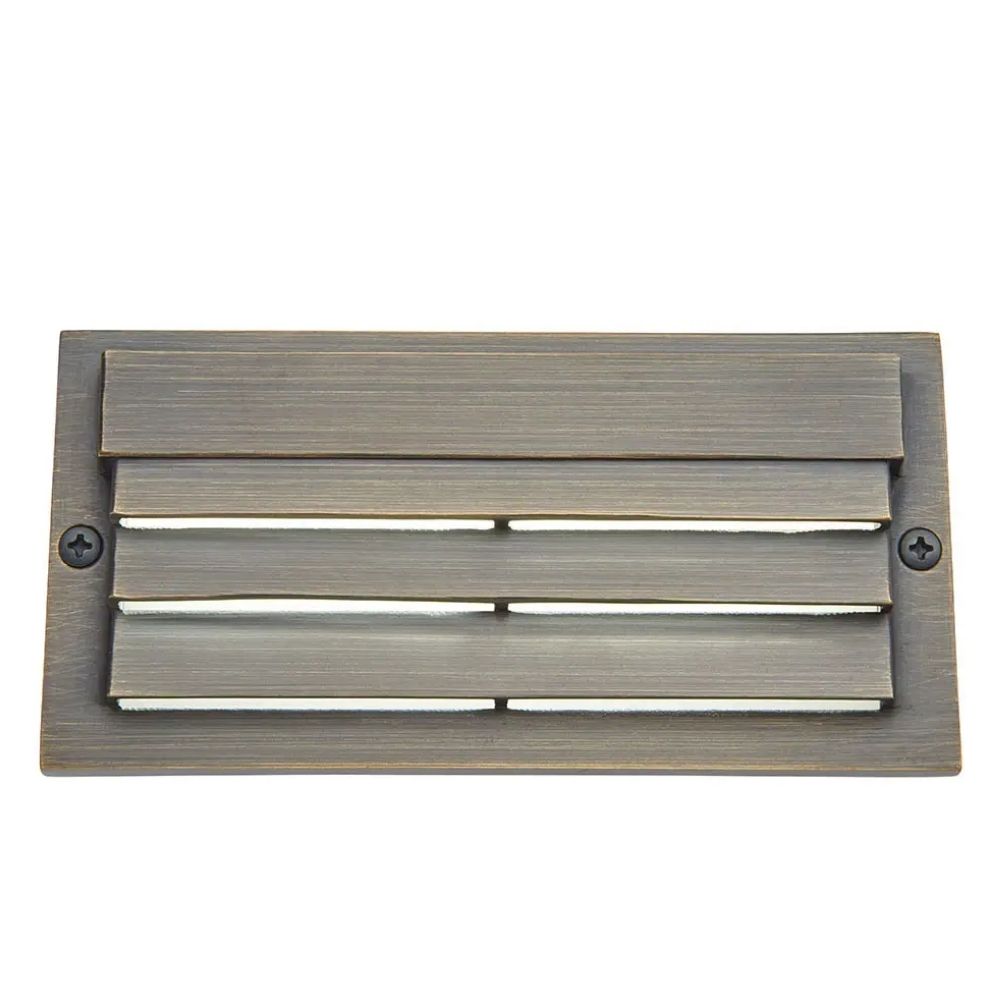 12V LED louvered step light in brass, rectangular housing with side screws