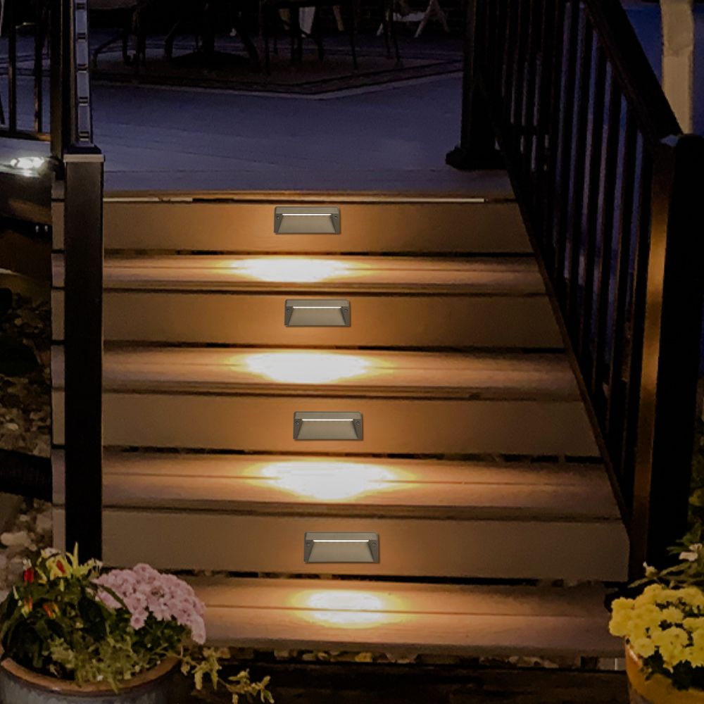 Warm white LED step lights illuminating outdoor stairs