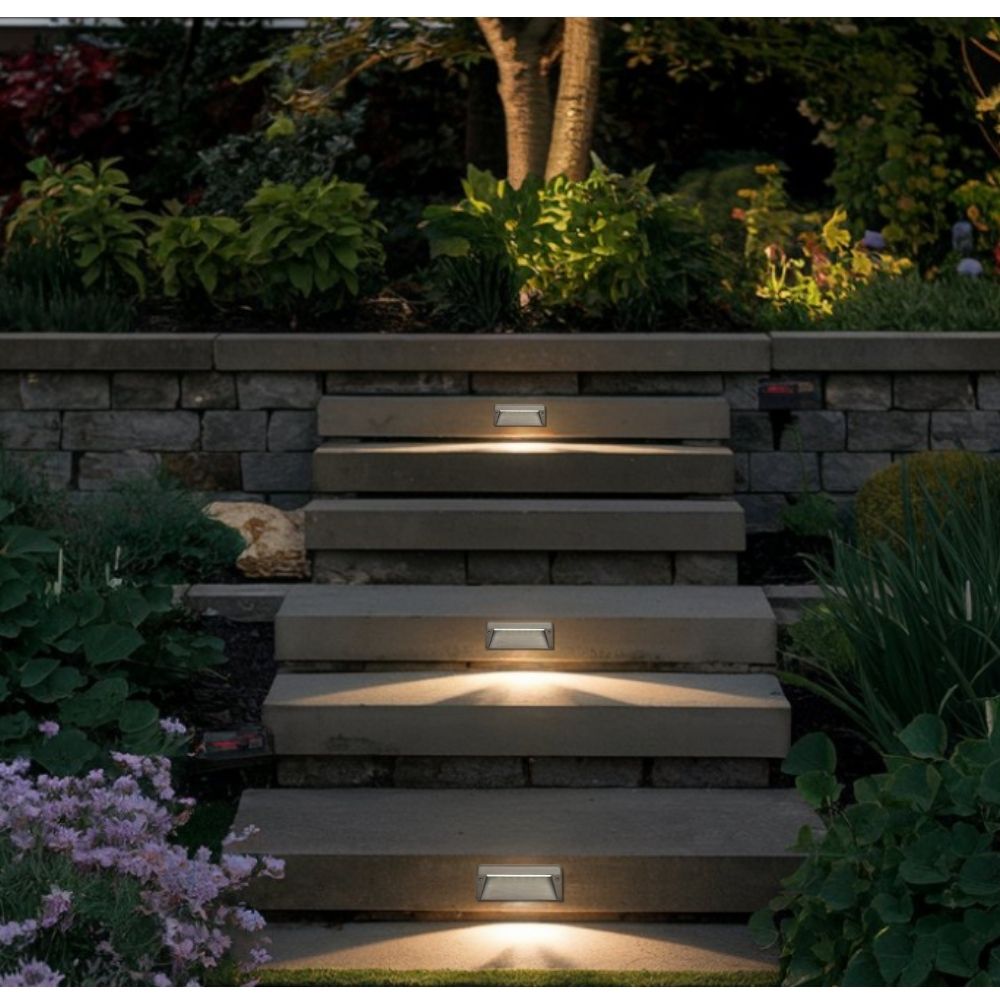 Brass-finish LED surface-mount step light with rectangular light lenses
