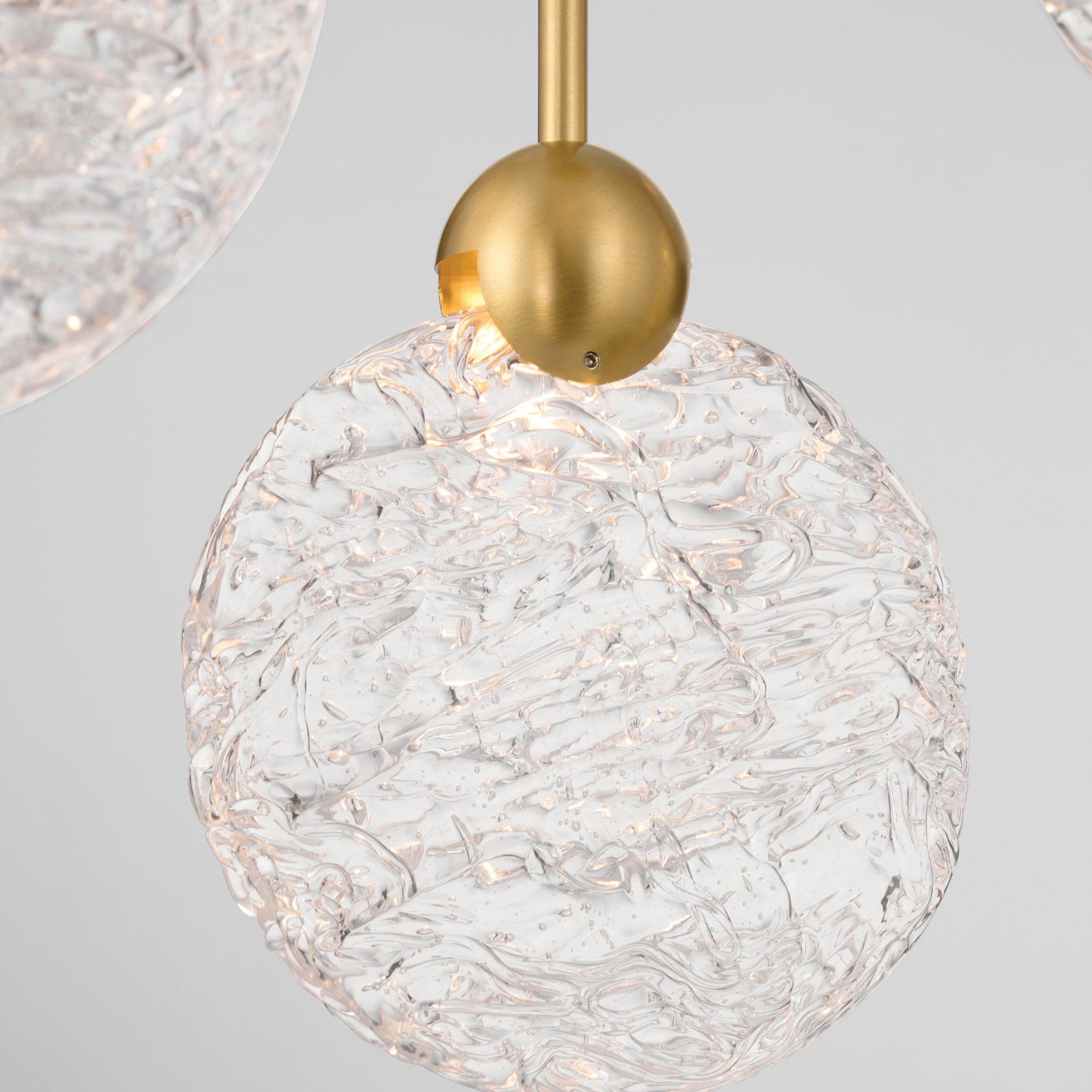 Metropolitan Briselle 24 in. LED Pendant, Legacy Brass with Clear Textured Glass