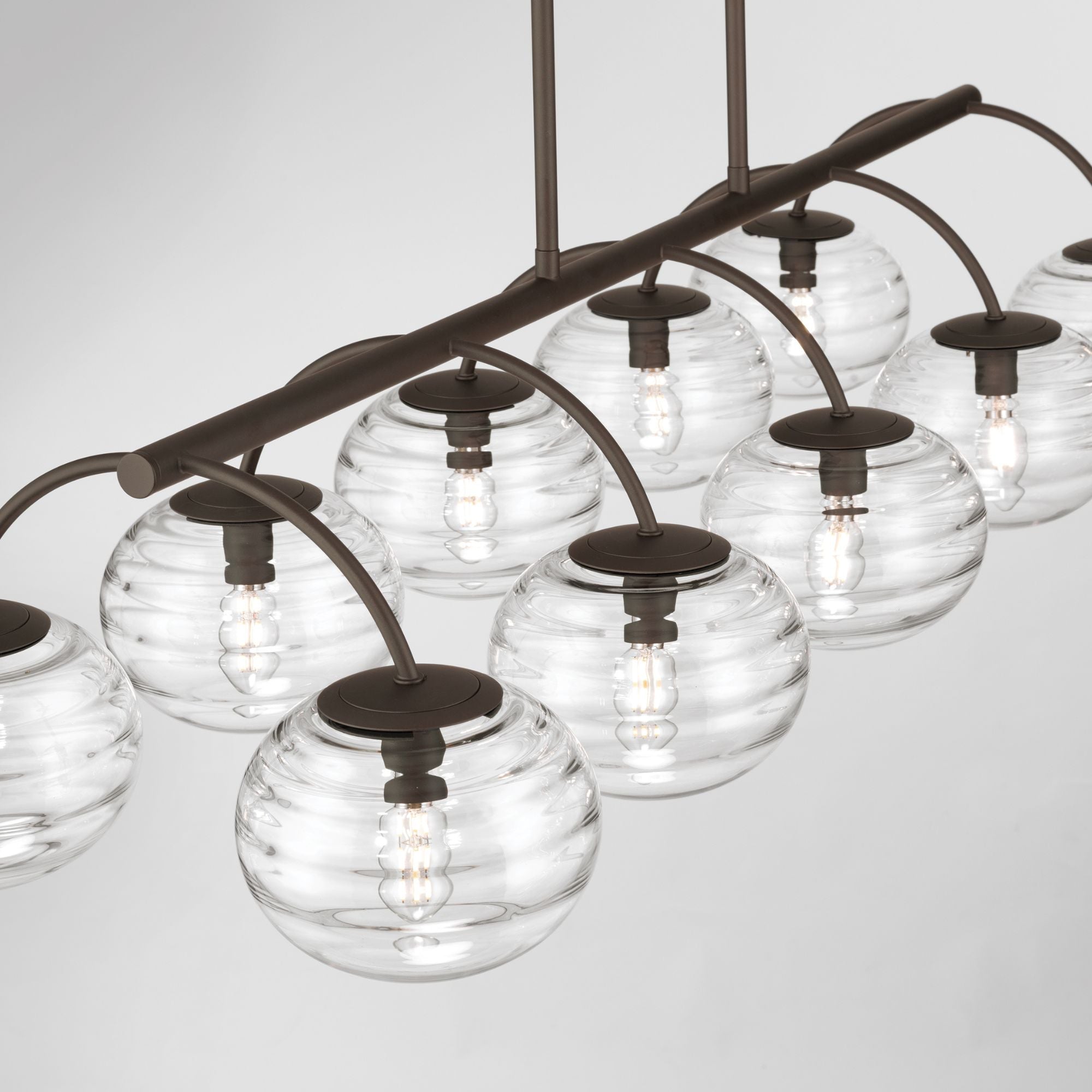 Metropolitan Lenora 47 in. 10-Light Linear Chandelier, Dark Bronze with Clear Ribbed Glass