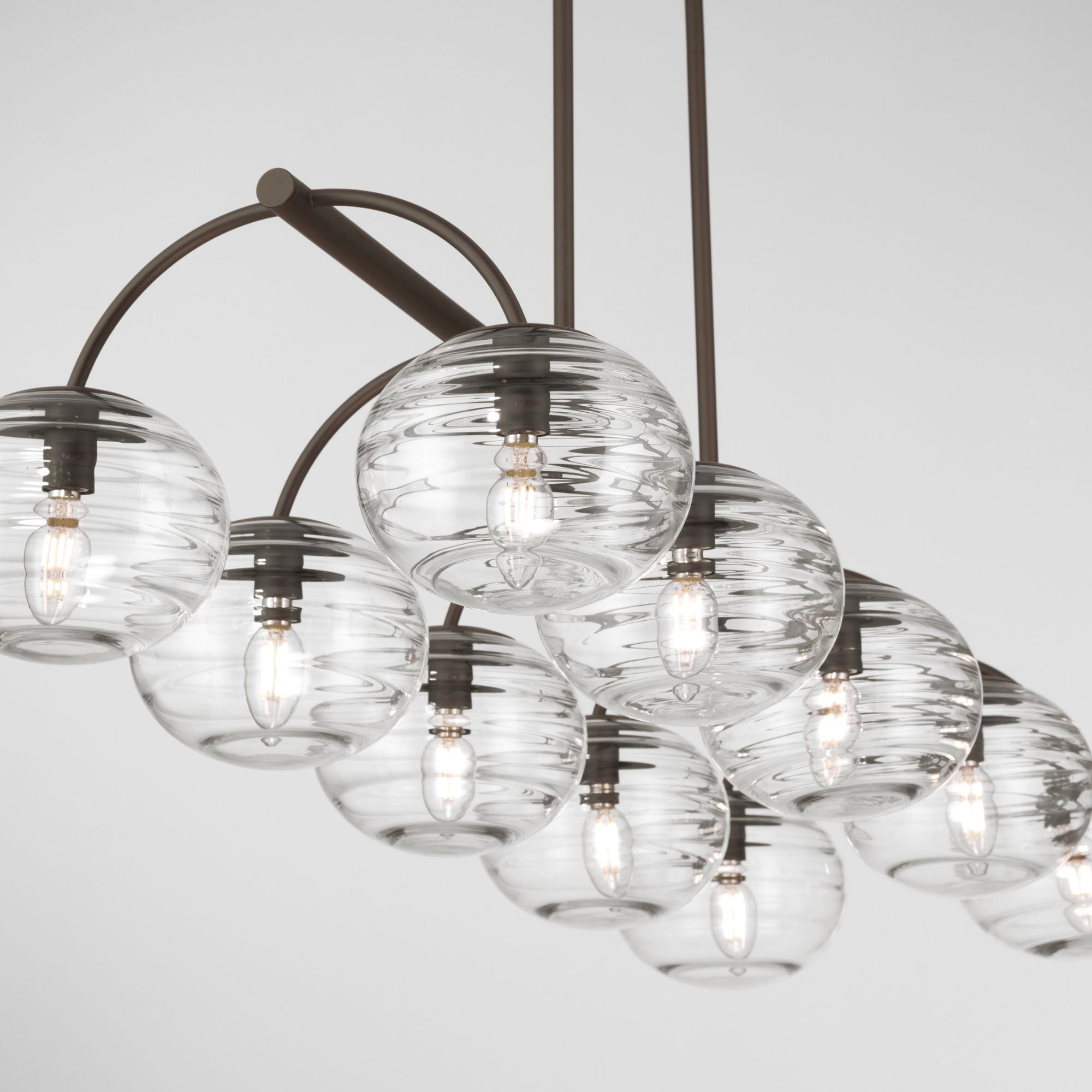 Metropolitan Lenora 47 in. 10-Light Linear Chandelier, Dark Bronze with Clear Ribbed Glass