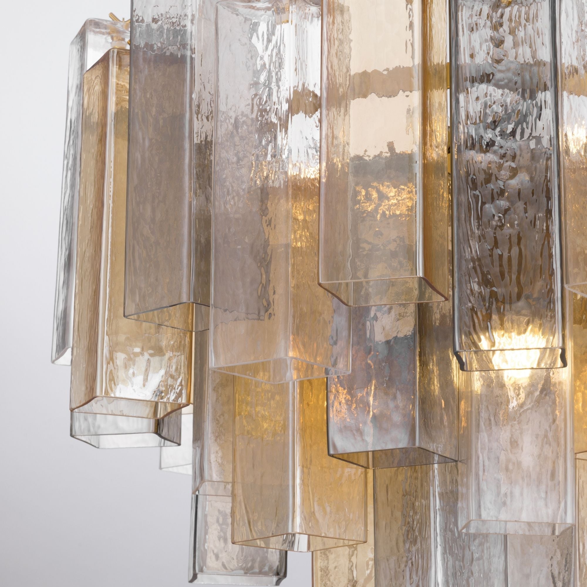 Metropolitan Torvento 25.25 in. 9-Light Pendant, Legacy Brass with Clear, Grey & Amber Art Glass