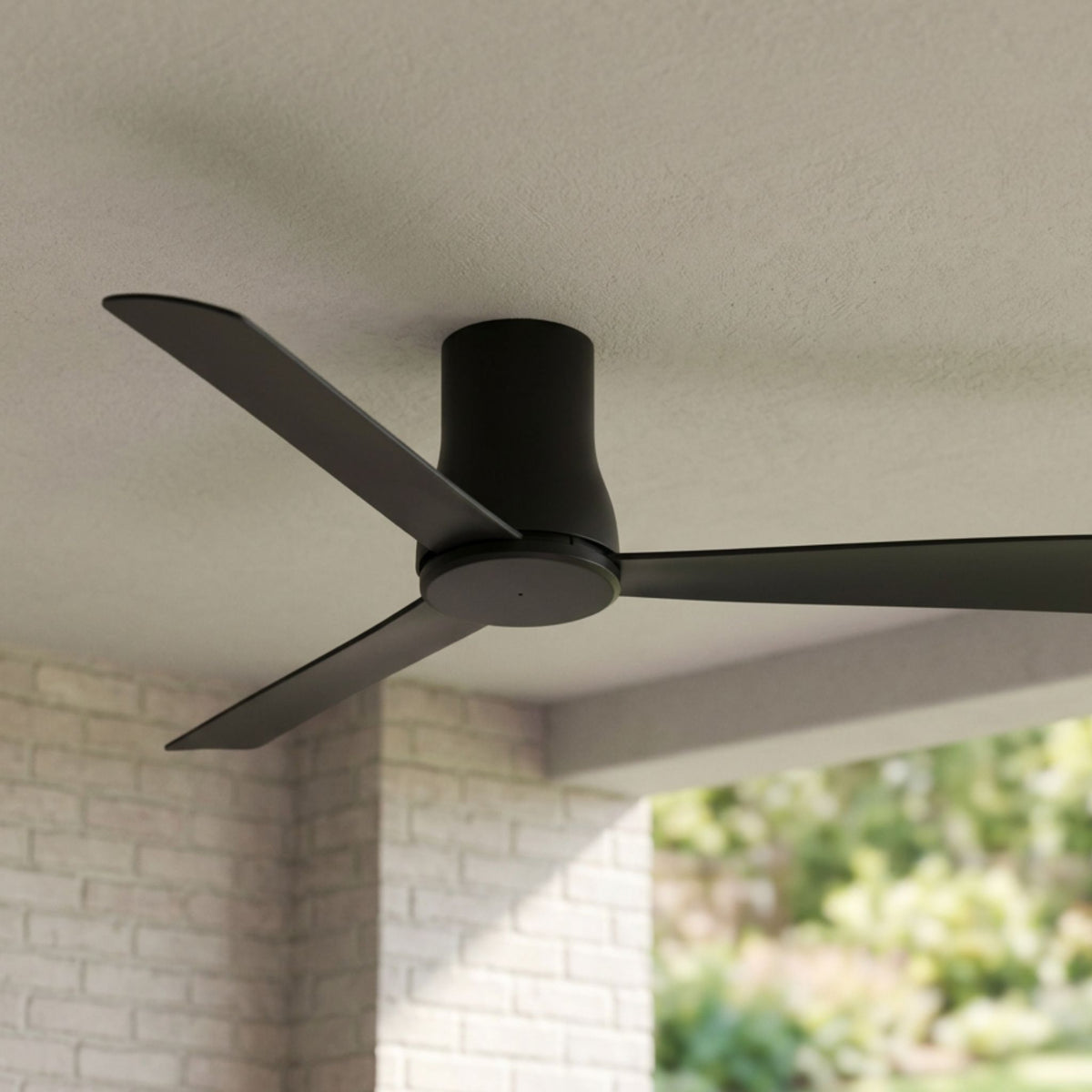 Minka Aire Simple Flush 52 in coal black ceiling fan with three sleek blades mounted flush to white paneled ceiling.