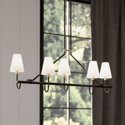 Minka-Lavery Bellforge 51 in. 5-Light Linear Chandelier, Legacy Brass & Dark Bronze with White Linen Shades