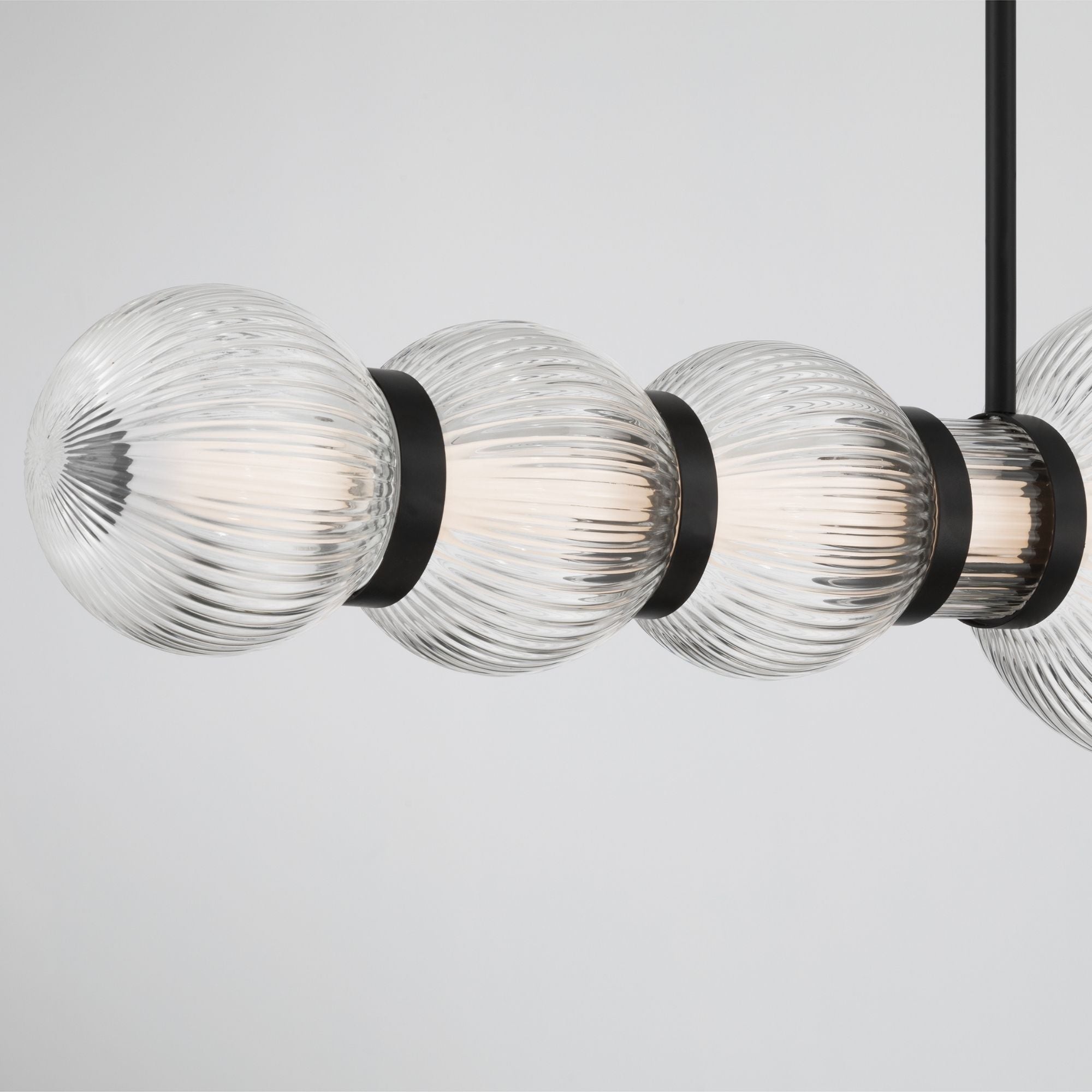 Minka-Lavery Cordel 50.25 in. LED Linear Chandelier, Dark Matte Black with Clear Ribbed Glass