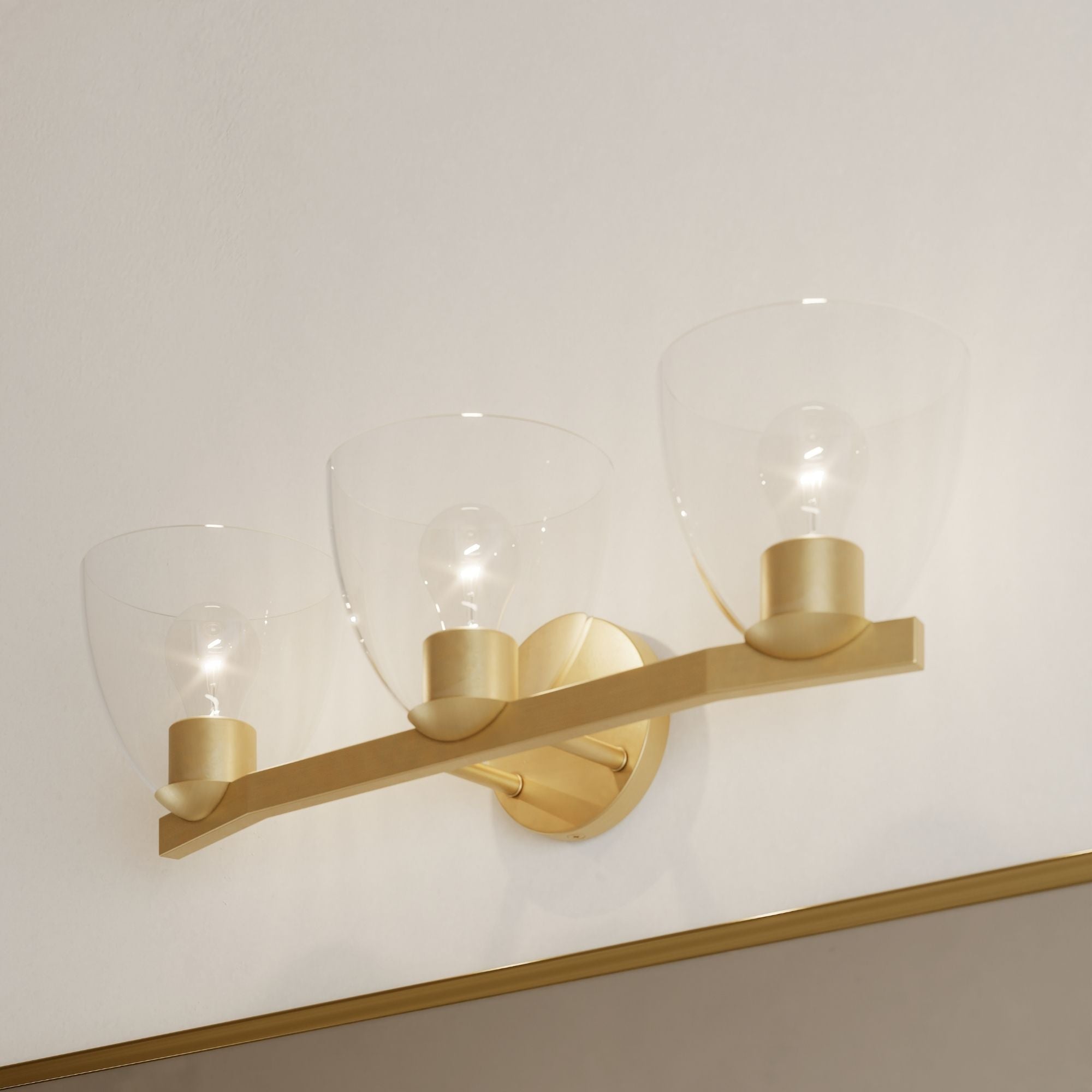 Minka-Lavery Noellea 23.5 in. 3-Light Vanity, Legacy Brass with Clear Tapered Glass