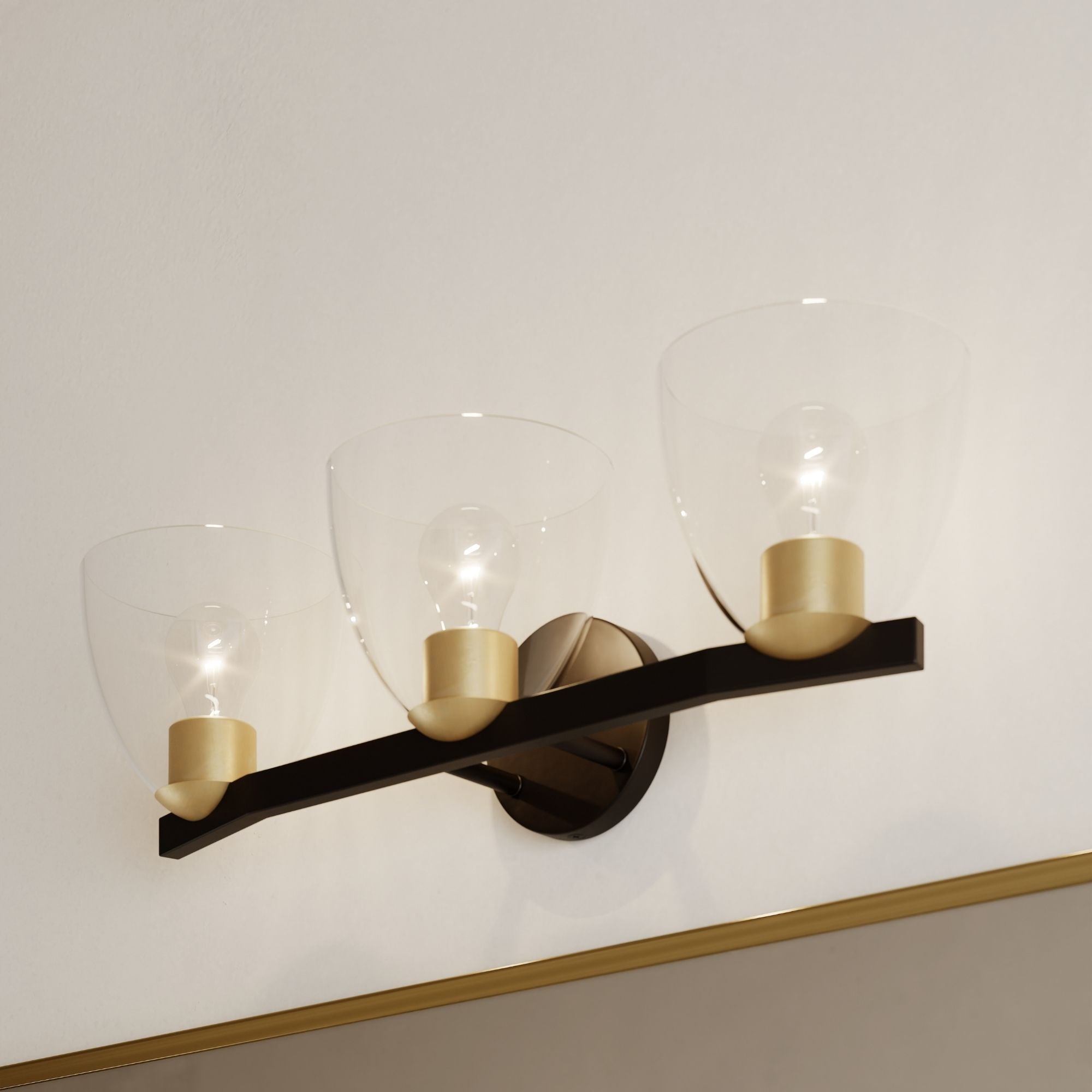 Minka-Lavery Noellea 23.5 in. 3-Light Vanity, Dark Bronze & Legacy Brass with Clear Tapered Glass