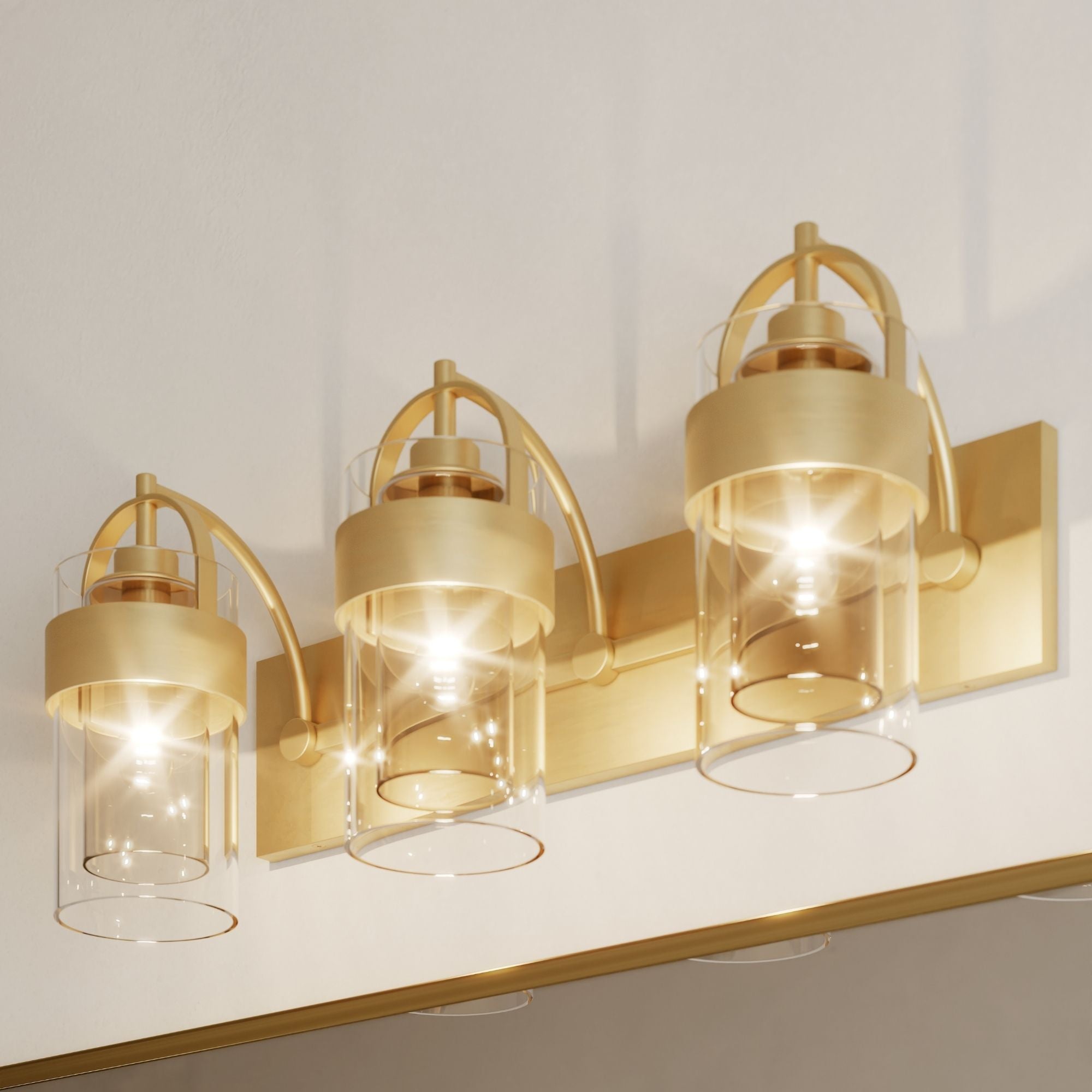 Minka-Lavery Ravik 24 in. 3-Light Vanity, Legacy Brass with Clear and Grey Cylinder Glass