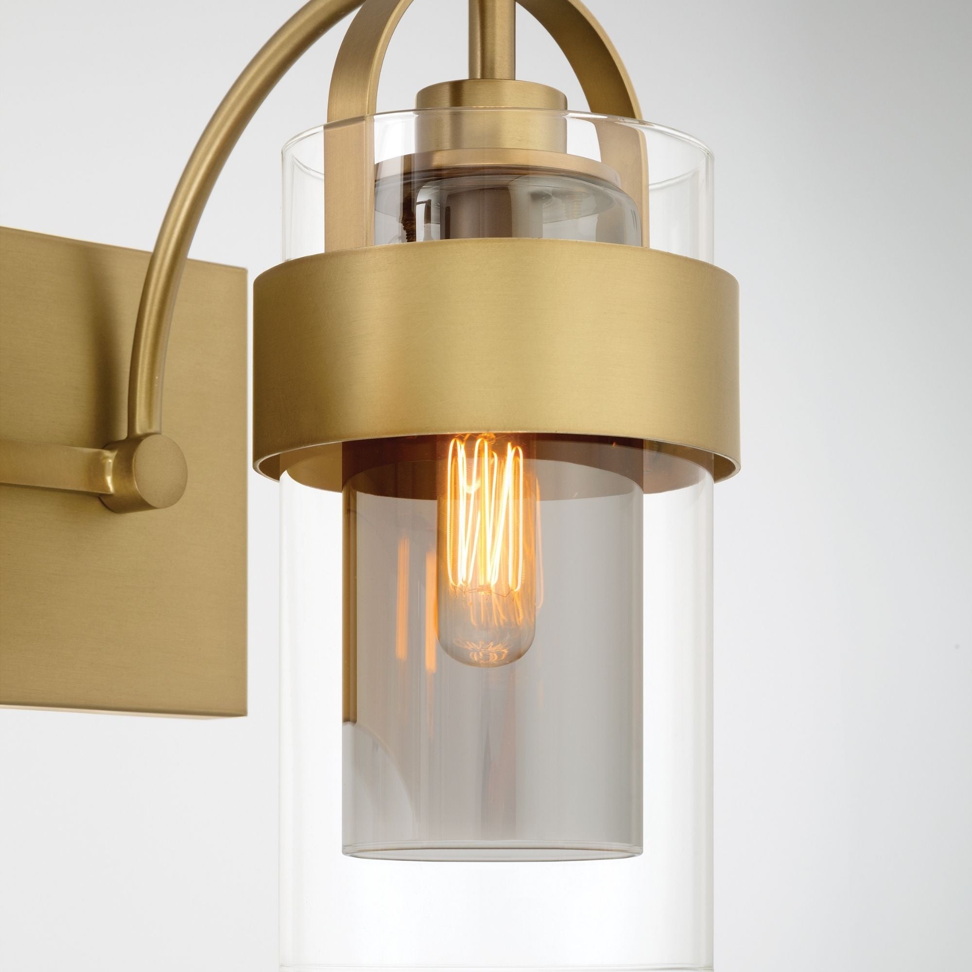 Minka-Lavery Ravik 24 in. 3-Light Vanity, Legacy Brass with Clear and Grey Cylinder Glass