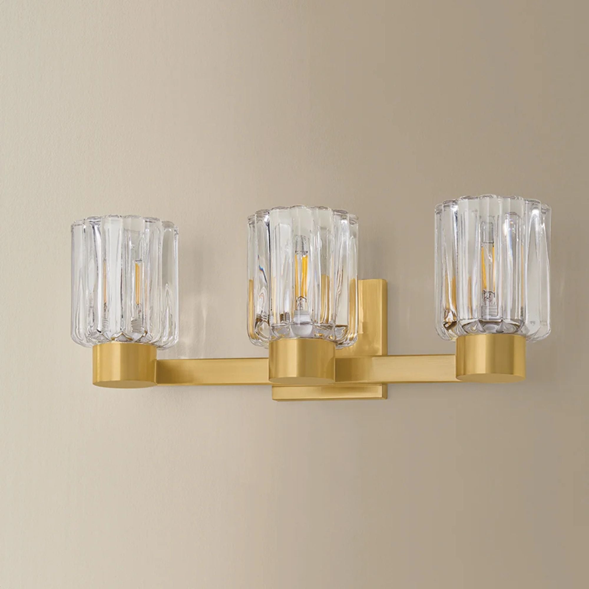 Mitzi Danae 18 in. 3-Light Bathroom Vanity Light, Aged Brass with Clear Optic Glass