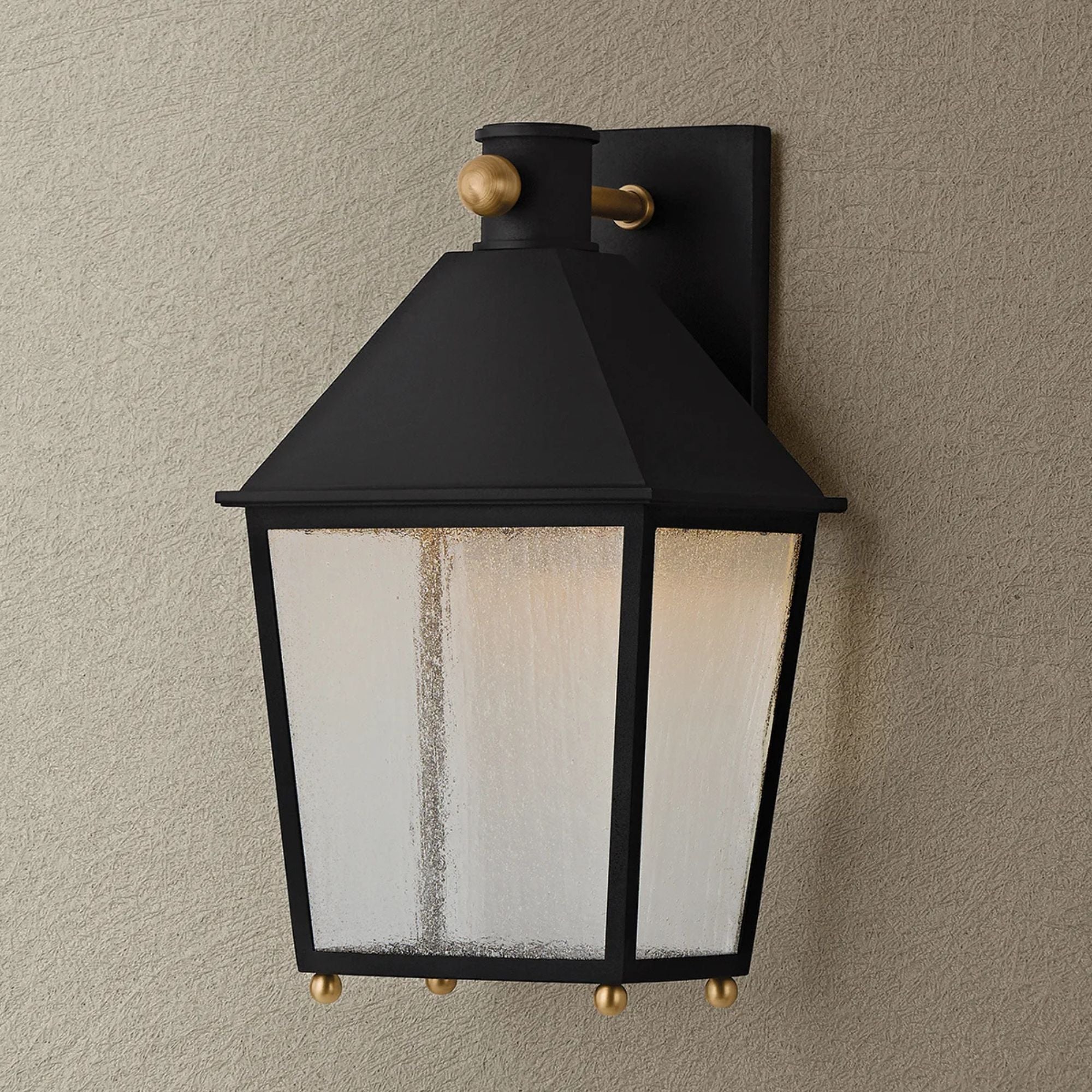Troy Gladden 15.5 in. Wall Sconce, Texture Black & Patina Brass with Clear Seeded Glass