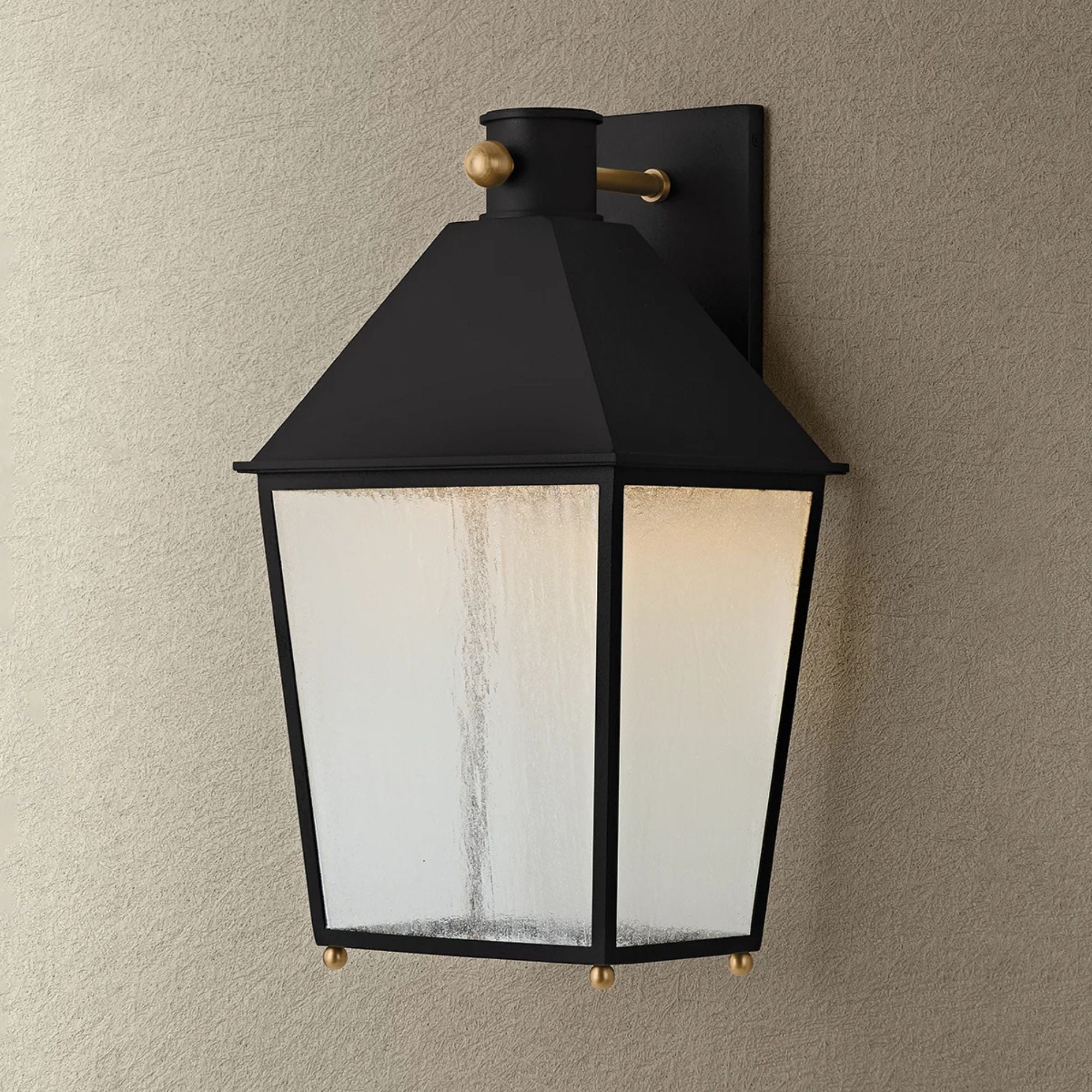 Troy Gladden 20.25 in. Wall Sconce, Texture Black & Patina Brass with Clear Seeded Glass