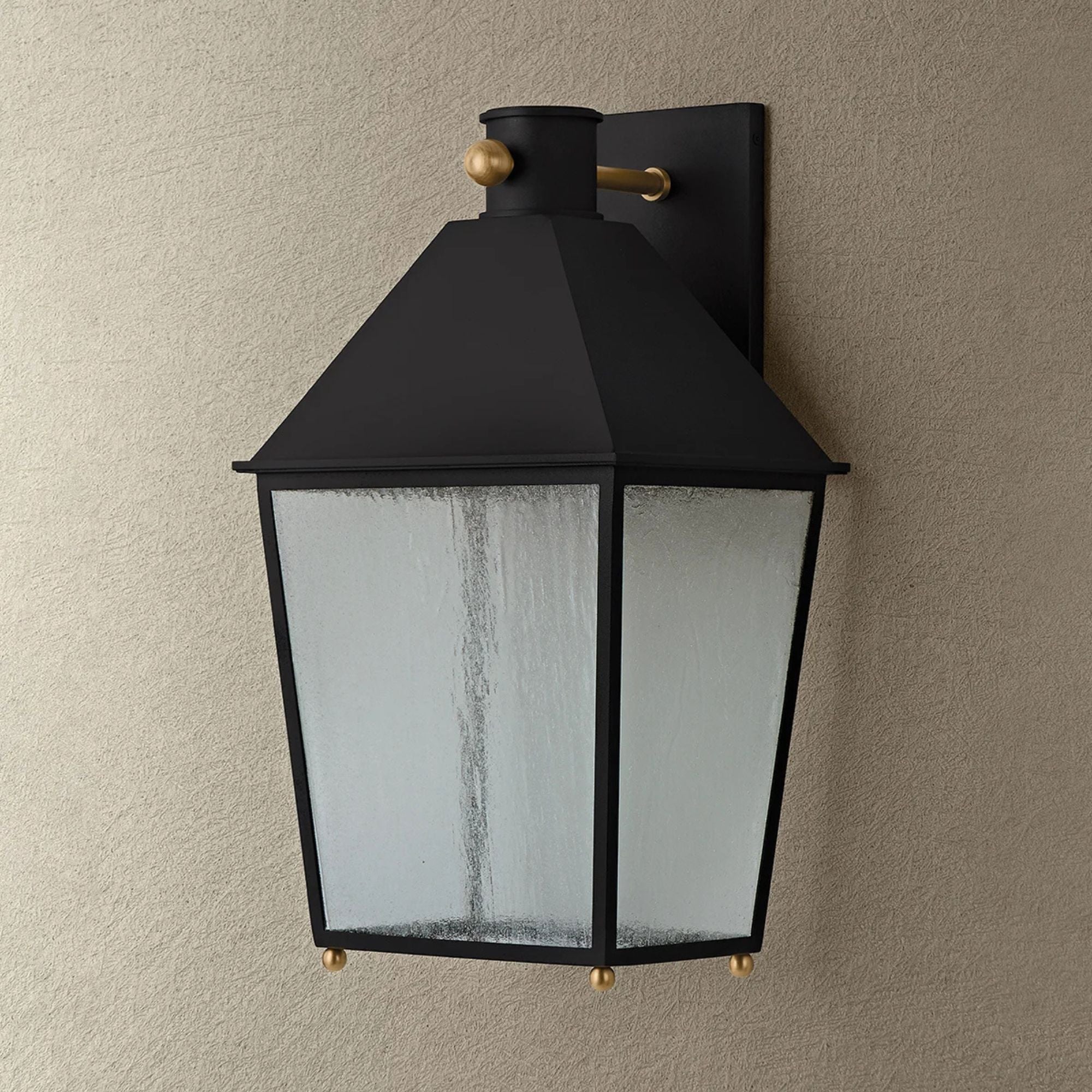 Troy Gladden 20.25 in. Wall Sconce, Texture Black & Patina Brass with Clear Seeded Glass