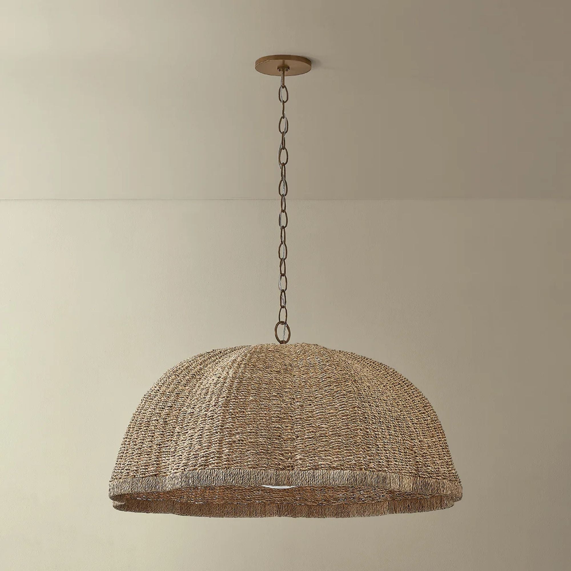 Troy Jack 36 in. Pendant Light, Patina Brass with Natural Woven Banana Fiber Shade & Clear Cloud Seeded Glass