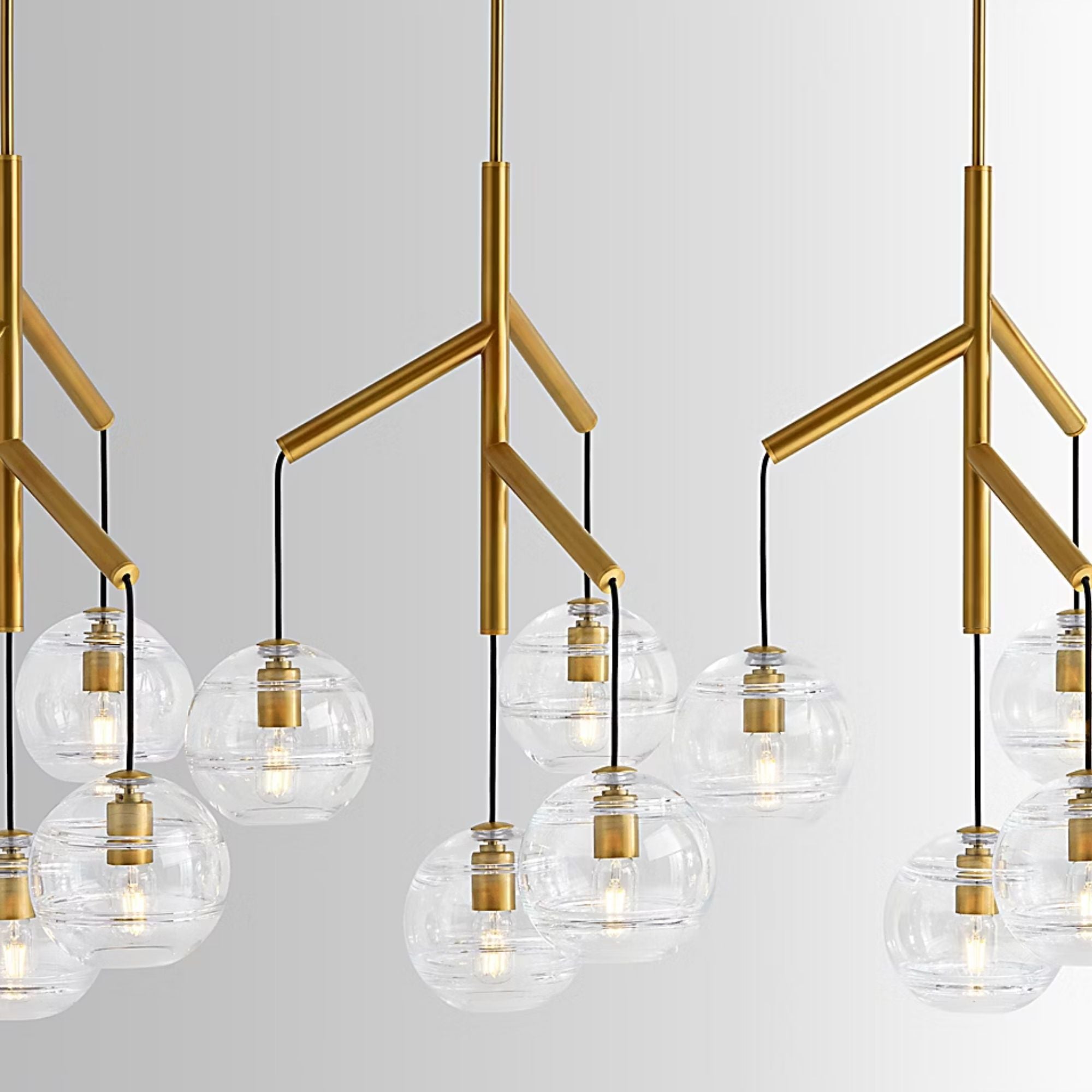 Visual Comfort Modern - Sedona 63" 12-Light LED Triple Chandelier, Aged Brass Finish | Bees Lighting